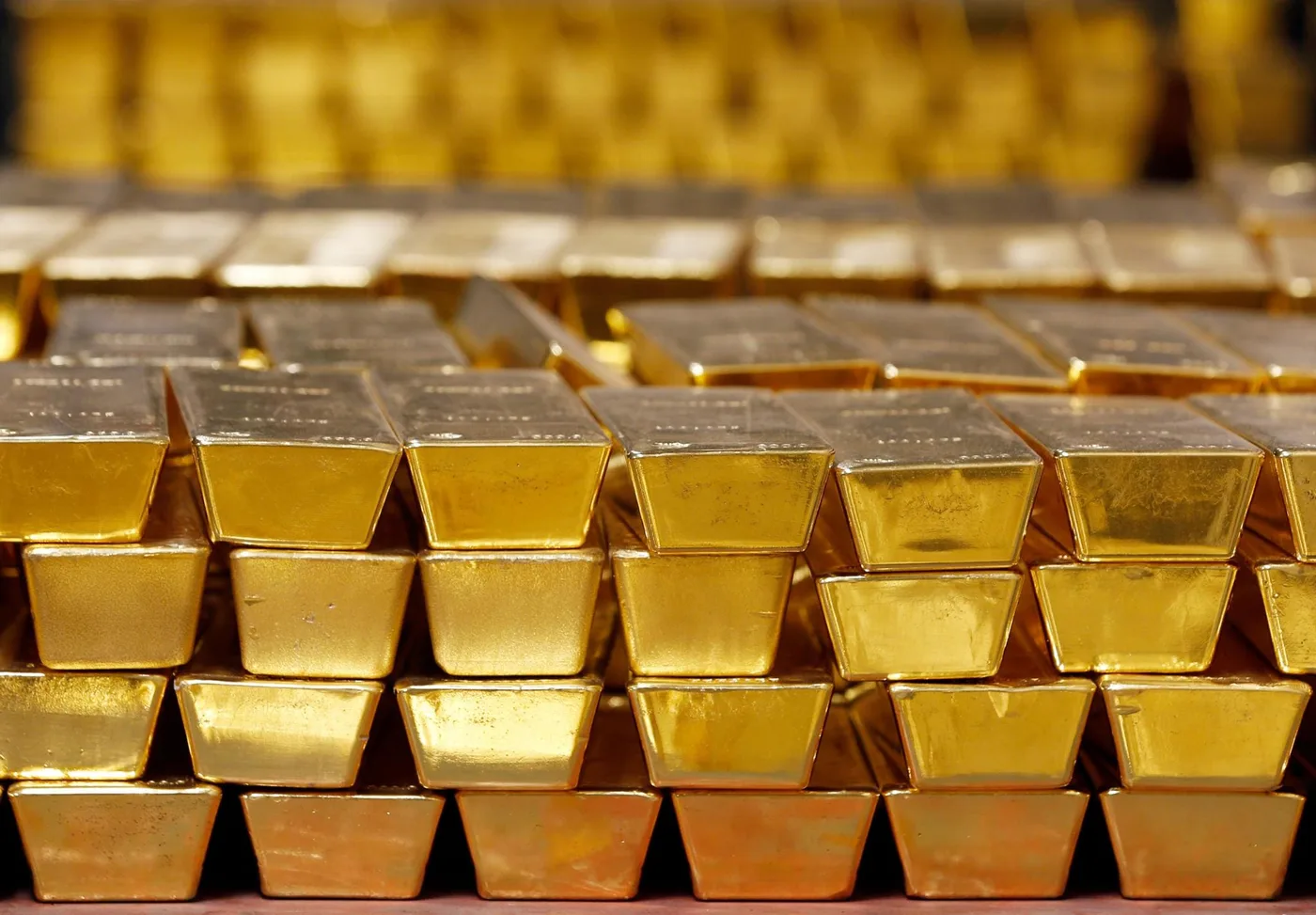 Gold tops $5,000 for the first time as dollar slides, global risks mount